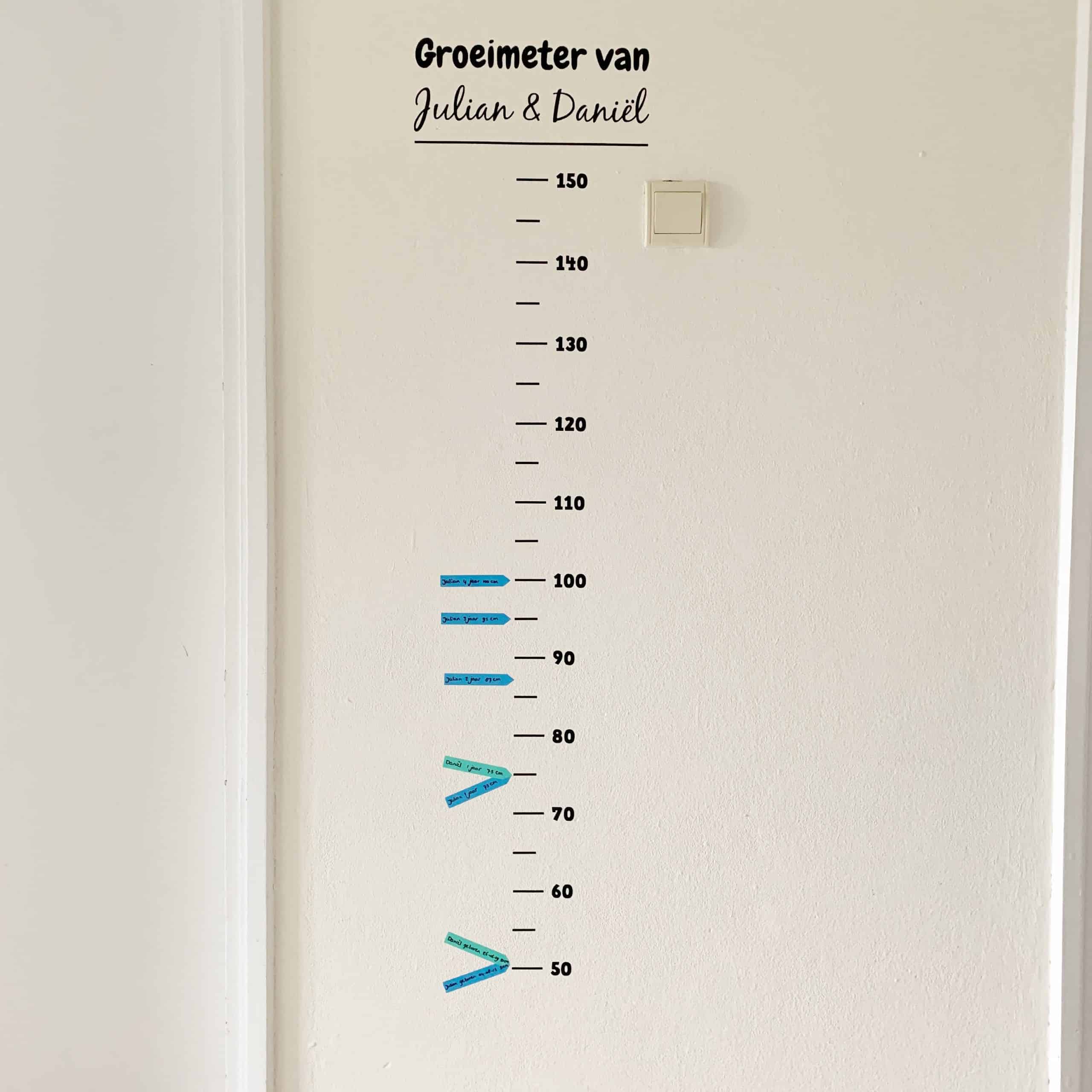Gepersonaliseerde groeimeter met naam en meetstreepjes