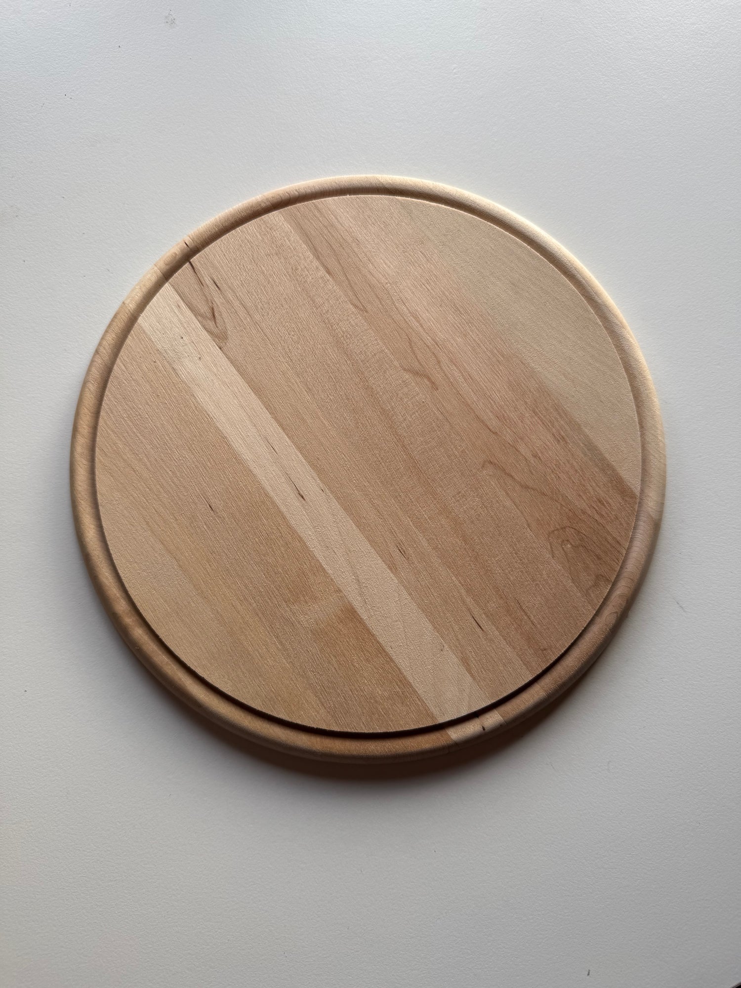 Ronde plank met tekst naar keuze