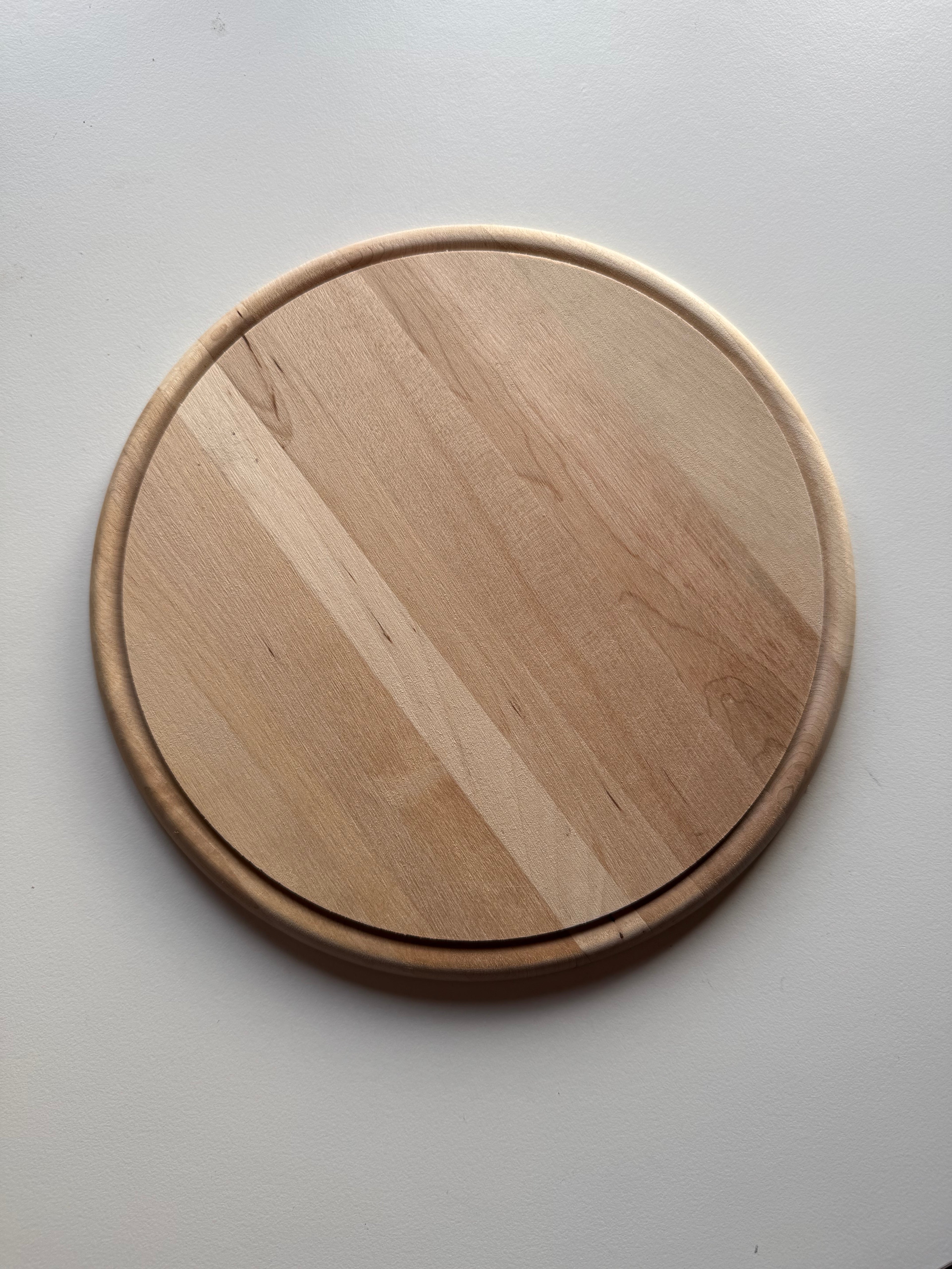 Ronde plank met tekst naar keuze