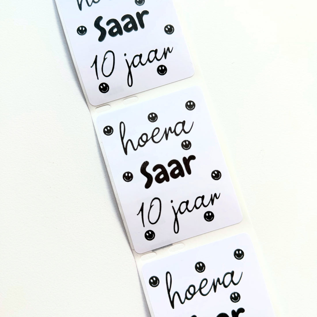 Smiley traktatiestickers met naam
